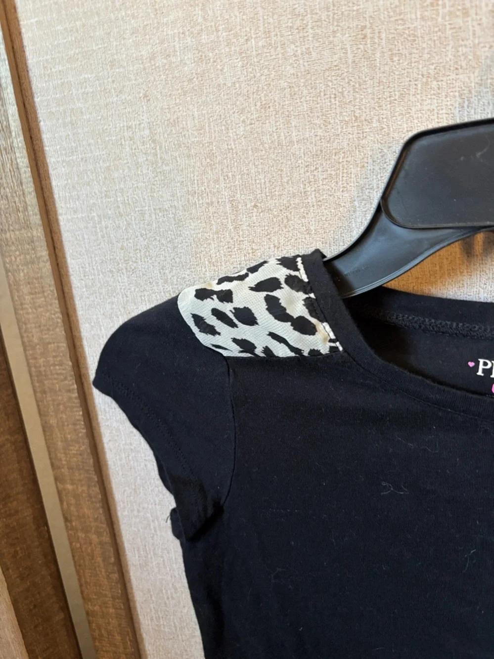 The Children's Place Black Tee with Leopard Accent Hem and Shoulders Large 10/12